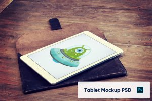 iPad平板电脑UI设计屏幕预览效果图样机 Tablet on Wooden Table Mockup PSD