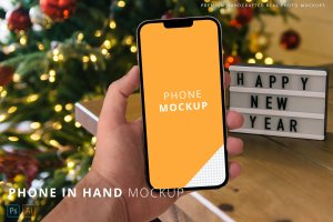 圣诞新年背景iPhone 13 Pro Max手机样机 iPhone 13 Pro Max Hand Christmas New Year Mockup