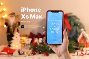 圣诞装饰背景手持iPhoneXs Max手机样机 Mockup Christmas Edition: iPhone Xs Max on hand